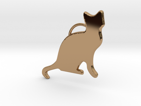 Cat Sitting in Polished Brass