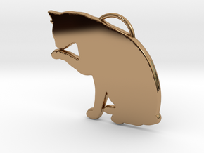 Cat Licking in Polished Brass
