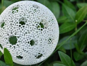 Two-point spherical star pattern in White Natural Versatile Plastic