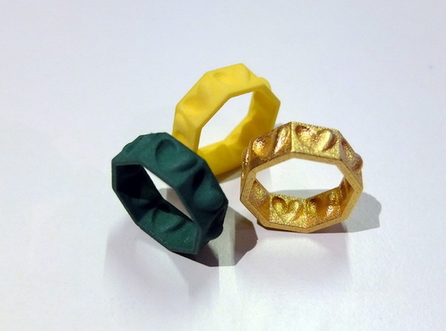 Half Hearted Ring ... a ring with a twist  in Polished Gold Steel