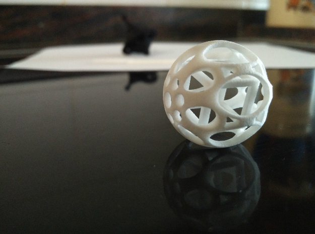 Sphere housing a cube in White Natural Versatile Plastic