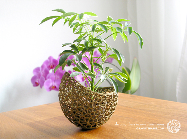 A burgeoning capsule Planter with small Pot