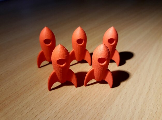 Five Funny Rocket keychains in Red Processed Versatile Plastic