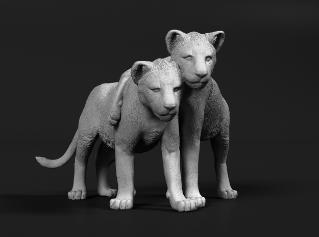 Lion 1:64 Cubs distracted while playing in Tan Fine Detail Plastic