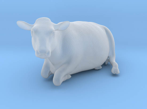 1/64 Dairy Cow Laying Down Looking Left in Tan Fine Detail Plastic