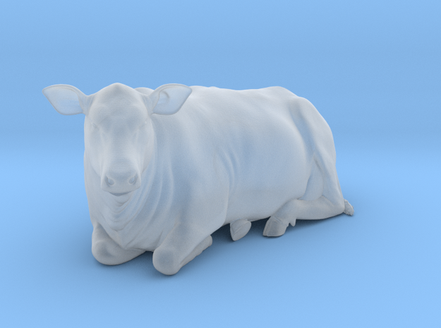 1/64 lying beef cow looking left in Tan Fine Detail Plastic