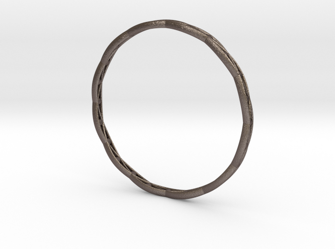 Bracelet in Stainless Steel: Bronze-infused stainless steel with visible print lines and rough feel.
