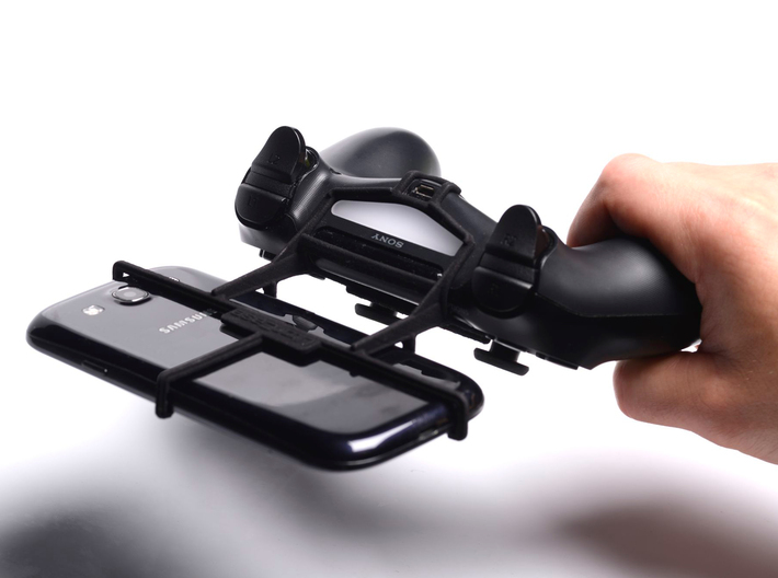 Controller mount for PS4 & Sony Xperia Z3+ dual 3d printed In hand - A Samsung Galaxy S3 and a black PS4 controller