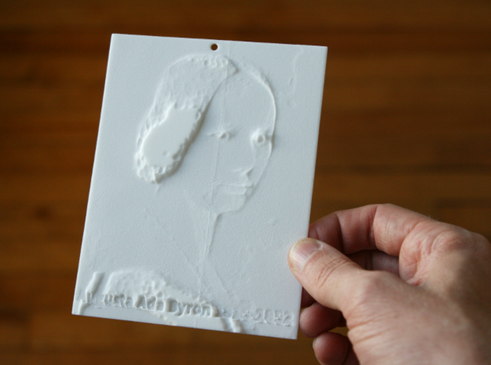 Ada Lovelace Shadowgram 3d printed Photo of the print lit from the front, revealing the relief