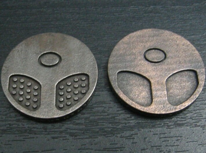 Panda coin 3d printed This version (on left) vs. unpatterned. Note loss of black in recesses. Also applies to front, to a lesser extent.