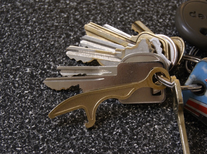 Bottle Opener Keychain 3d printed The brass bottle opener fits in with your keys