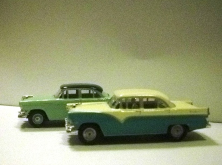 55 FORD WHEEL 3d printed Foreground: Town Sedan with full wheel covers. Behind is customline with CMW wheels.