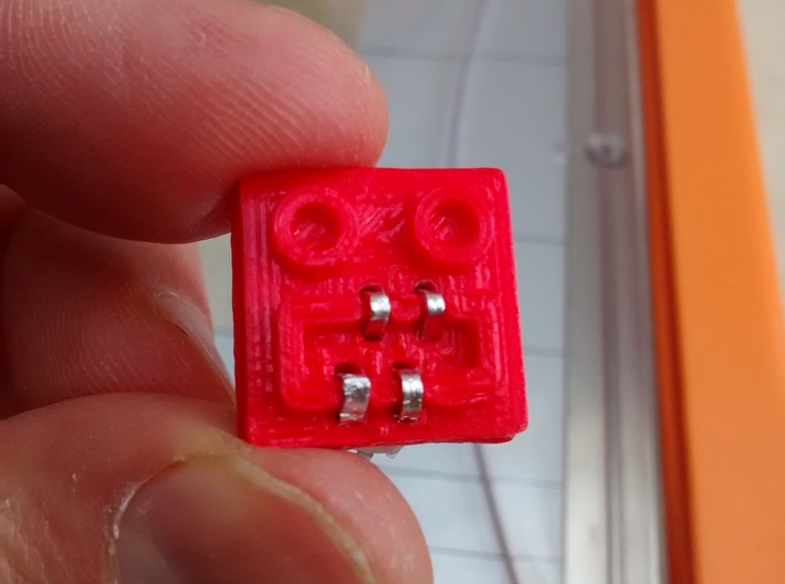 LEGO® Power Functions-compatible socket base 3d printed model printed in PLA on a µDelta with electrical contacts inserted