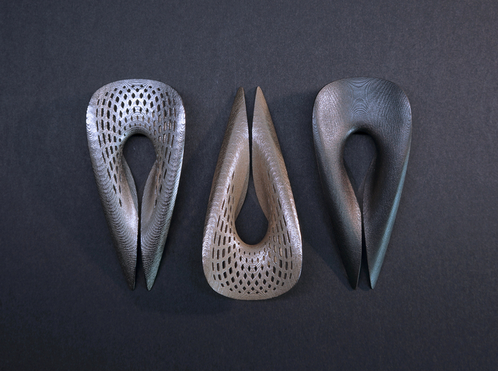 Splendor Solis - Bottle Opener - Perforated 3d printed from left to right: Polished Nickel, Stainless Steel, Matte Black Steel
