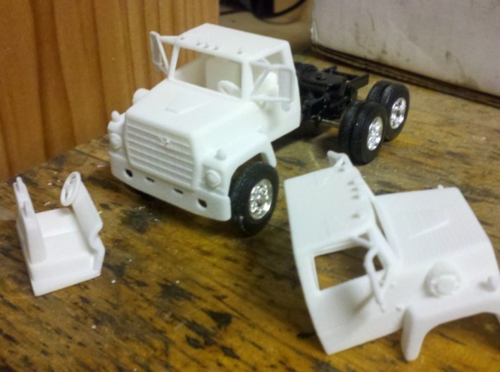1/64 LN 900 Truck Cab with Interior 3d printed As shipped sitting on Ertl Mack frame