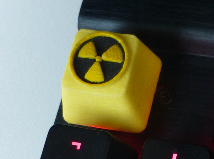 Radioactive Cherry MX Keycap 3d printed This keycap has had black acrylic ink added as a finishing effect.