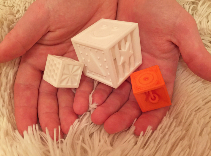 Pyramid Cube Tactile Dice 3d printed a photo comparing 3 of our dice...