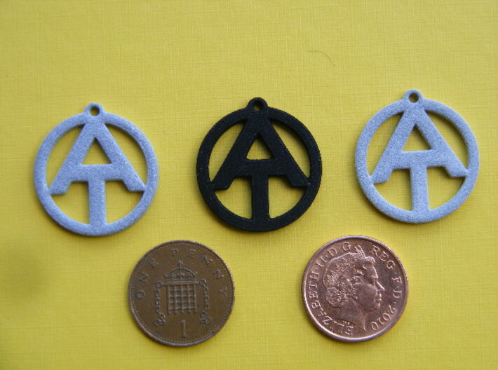 AT Dog Tag 3d printed Left to Right; Polished Alumide, Black/Strong/Flexible, Alumide