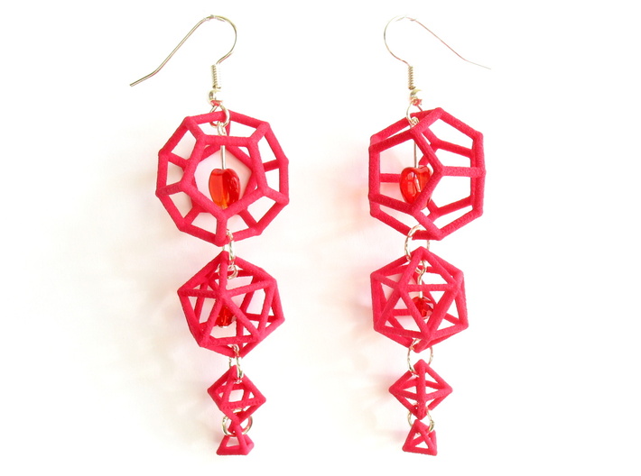 Platonic Progression Earrings - Clean 3d printed An example of these earrings made fancy, with heart-shaped beads added as well as earwires