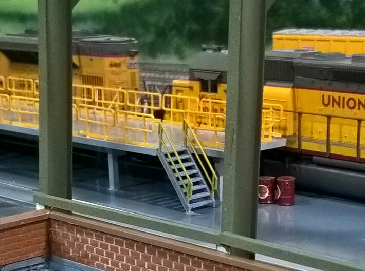 HO Maintenance Railings 4x25 3d printed The #8 stairs and maintenance railings at the Chippewa, Marquette, St. Charles and Pacific RR locomotive facility. Thanks for the picture Greg!!