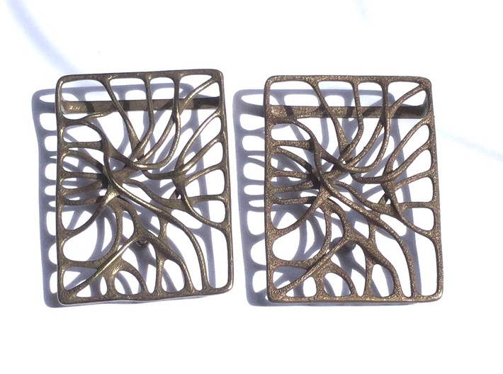 Belt Buckle 'Connect' 3d printed polished bronze steel vs. unpolished bronze steel