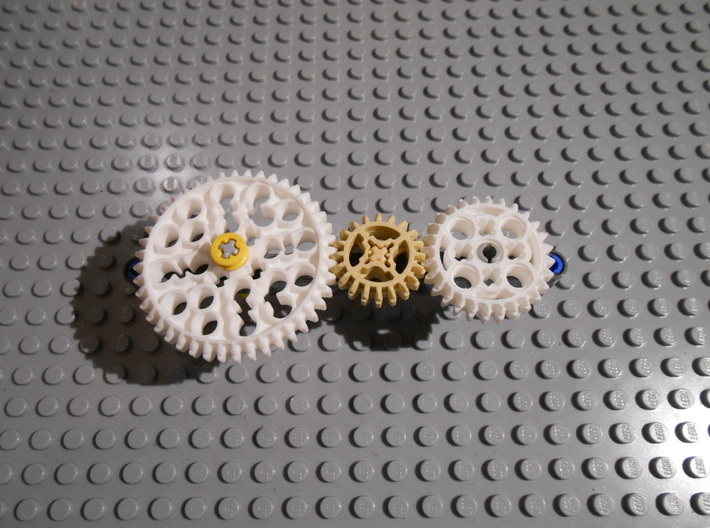 LEGO®-compatible 28-tooth bevel gear with pinhole 3d printed Z44, Z20 and Z28 bevel gears meshing together