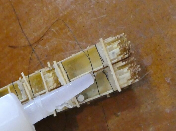 2x4 2x8 And 4x4 Lumber Load, N Scale, Flat Car 3d printed Glue the knot to finish.  Fine fly fishing thread is used.