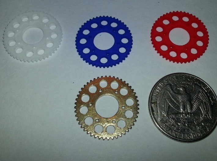 Motorcycle Sprocket Pendant or Golf Ball Marker 3d printed Materials Shown: Raw Brass and Strong and Flexible Polished (Royal Blue, Coral Red, White)