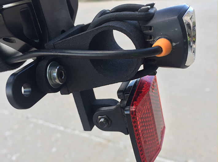 Tail-light Bracket For Iberia IB-RA11 and MagicShi 3d printed Bracket attached to Ibera IB-RA11 bike rack, with Magic-Shine Tail Light and reflector attached. 