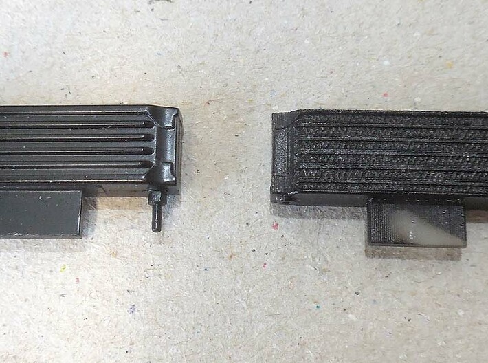 Oil cooler for the 1/8 MP4/4 Kyosho/DeAgostini mod 3d printed original part (left) vs. printed part, painted (right)