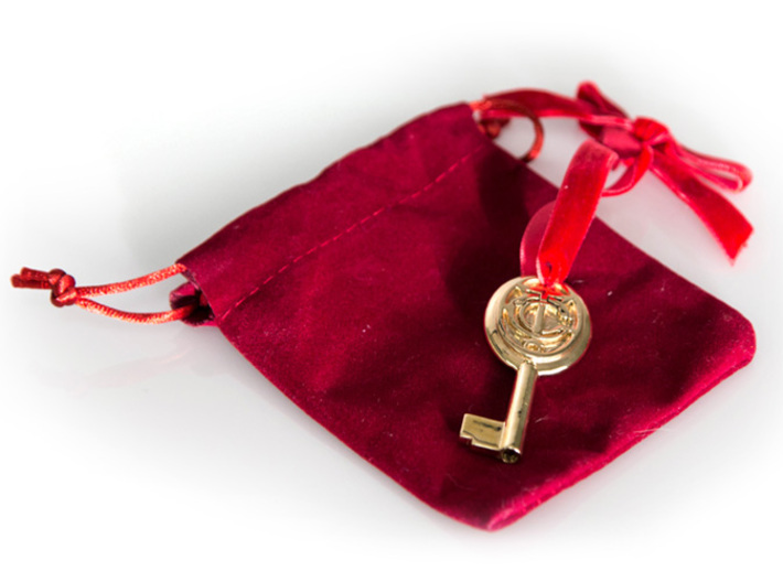 Grand Central Key 3d printed Printed in polished brass, with red velvet ribbon and bag