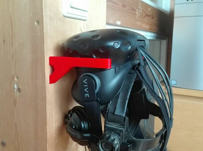 Vive Hmd Wall Mount 3d printed The wall mount in red stands out to the Vive