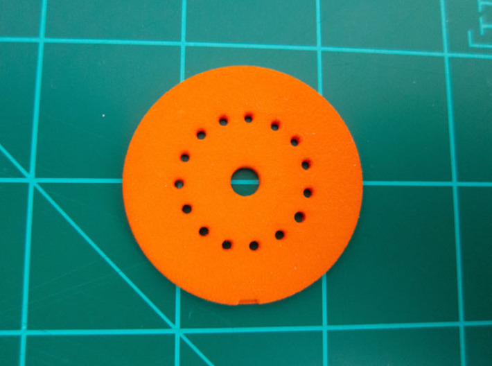 LED Mounting Disc - 1:350 Alternative Part 3d printed Printed part in "Strong and Flexible" orange polished plastic.