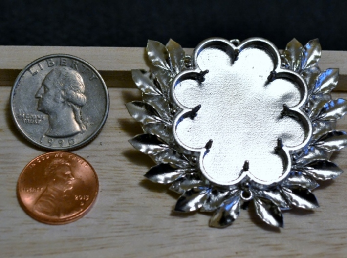 Laurels' Medallion 3d printed In polished silver with coins to scale by.  