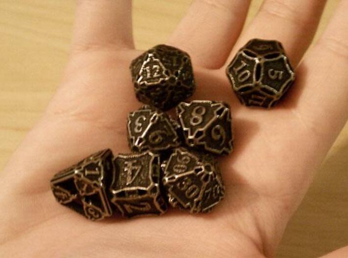 Premier Dice Set 3d printed In stainless steel and inked.