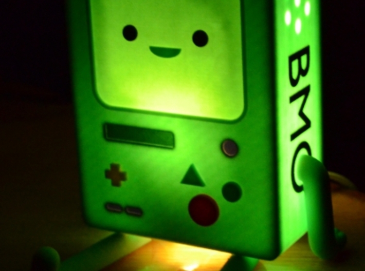 BMO Lamp in Color 3d printed Lit with a 7watt bulb.  Comes across more as a night light than a lamp.