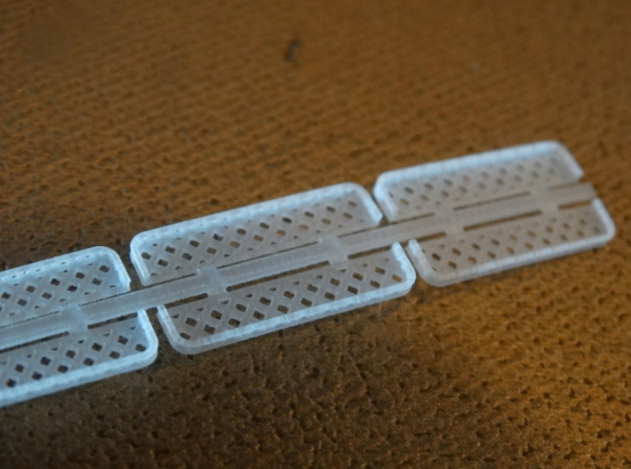 HO Pullman Parlor Car Luggage Racks Set 3d printed Our luggage racks are delivered fastened to sprues like this one.