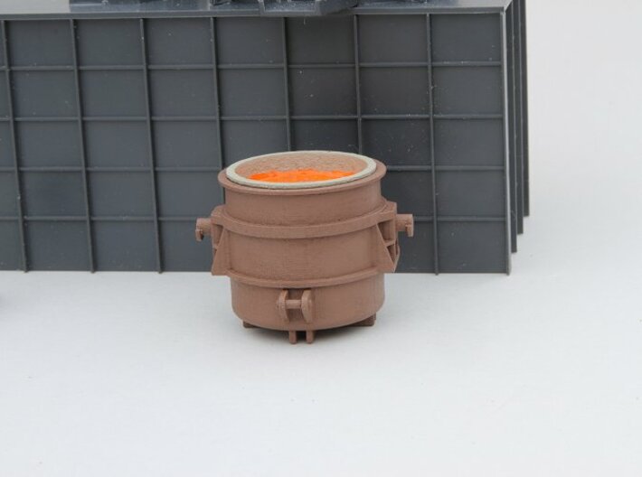 N-scale 250 ton Teeming Ladle, loaded 3d printed 250 ton loaded teeming ladle shown with the Walthers Cornerstone Electric Furnace as a background.