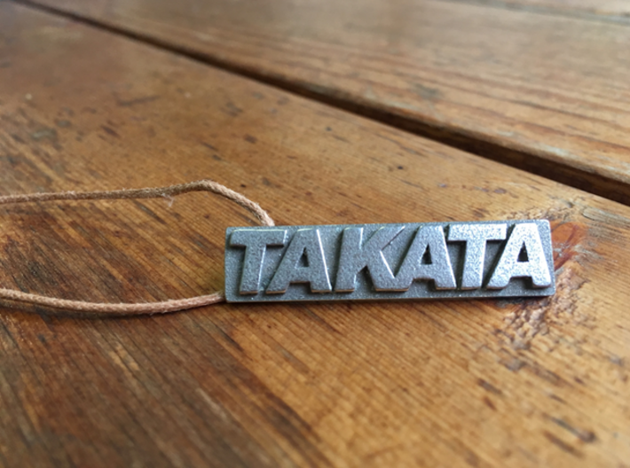Takata Racing - Pendant 3d printed The Takata product can be turned into a Keyring, Neclace, Keyring or Pendant