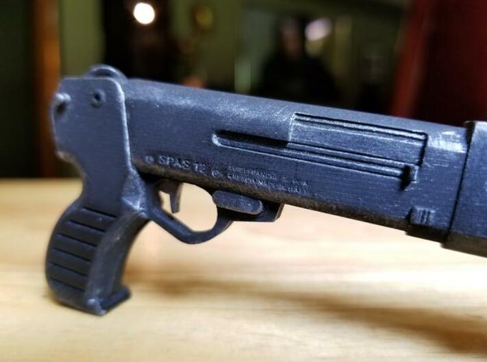 SPAS 12 1:4 scale shotgun without pump 3d printed SPAS-12 model in frosted ultra detail, hand painted.  Size shown is 1:4 scale.  the moveable pump can be purchased separately.
