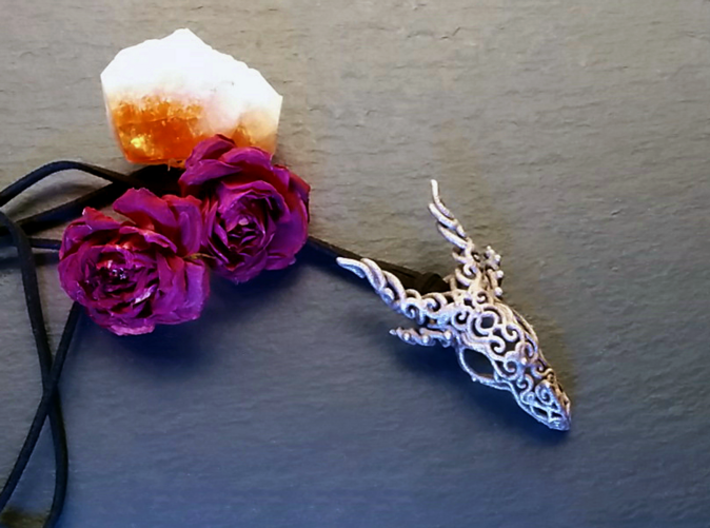 Dragon of Swirls 3d printed With awesome crystals and a couple mini-roses. Not for scale, just because they're cool.