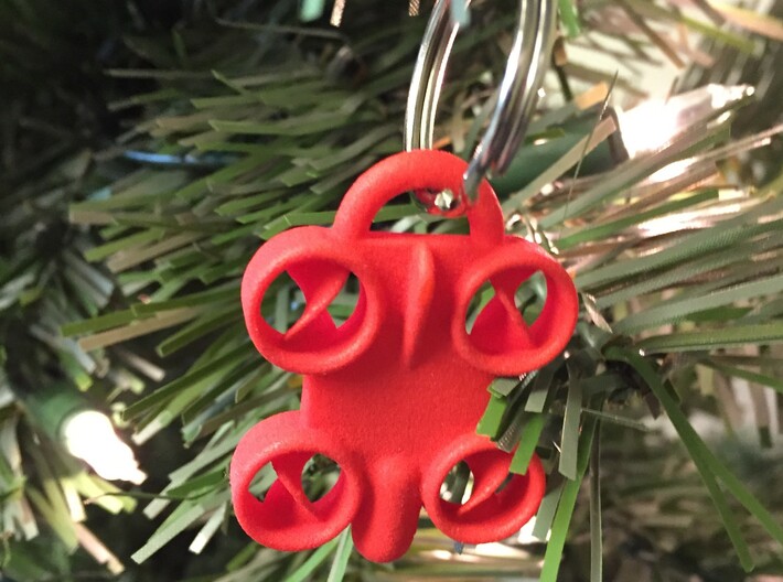 Minature Drone Ornament 3d printed Red Keychain shown being used as a Christmas tree ornament.  Key ring not included with purchase.