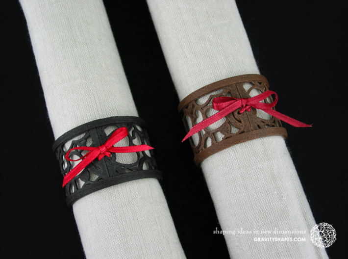 Set of 4 large napkin rings with Hearts 3d printed The photo shows an own print (FDM print) made of brown/black wood incl. decorative lacing.