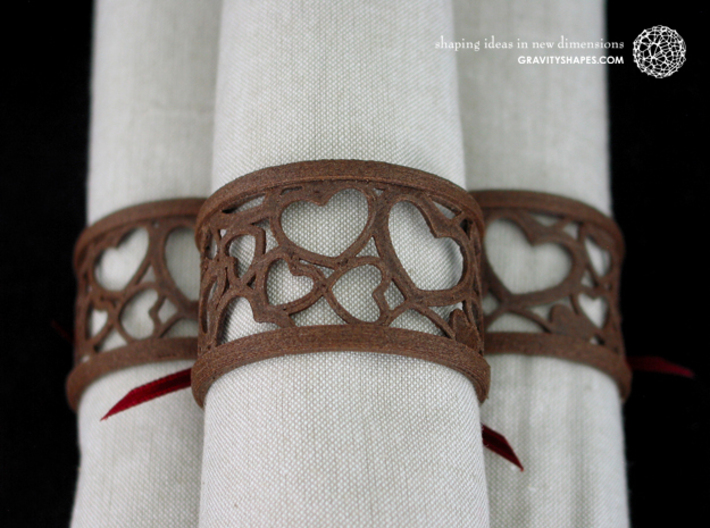 Set of 6 large napkin rings with Hearts 3d printed The photo shows an own print (FDM print) made of brown wood incl. decorative lacing.