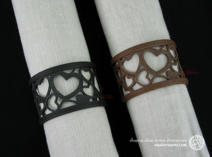 Set of 6 large napkin rings with Hearts 3d printed The photo shows an own print (FDM print) made of brown/black wood incl. decorative lacing.