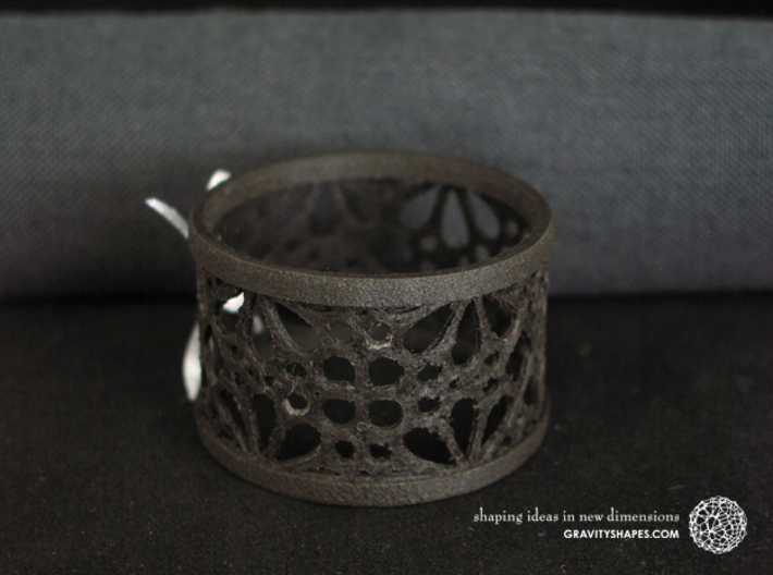 Set of 2 large napkin rings with Mosaic-3a 3d printed The photo shows an own print (FDM print) made of black wood incl. decorative lacing.