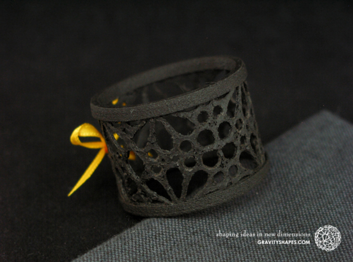 Set of 2 small napkin rings with Mosaic-3a 3d printed The photo shows an own print (FDM print) made of black wood incl. decorative lacing.