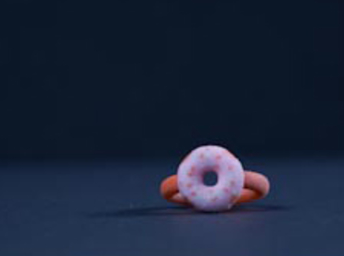 The Glazed Donut Ring (Size 4 and 3/4) 3d printed Strawberry glazed with rainbow sprinkles.
