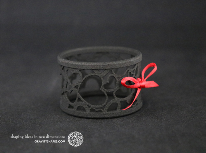  A large napkin ring with Hearts  3d printed The photo shows a print made of black strong and flexible incl. red lacing.