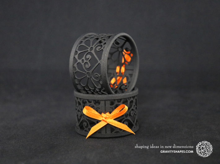 Set of 2 large napkin rings with Mosaic-3b 3d printed The photo shows prints made of black strong and flexible incl. orange lacing.